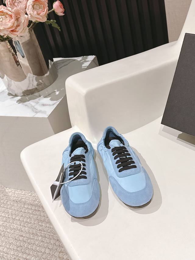 New colorways are available for the Prada Collapse recycled nylon and suede str