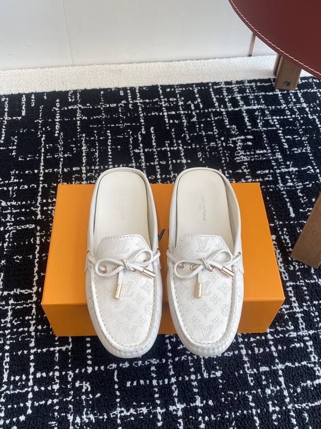 Agent-grade Louis Vuitton Gloria flat-soled loafers are crafted from premium cow