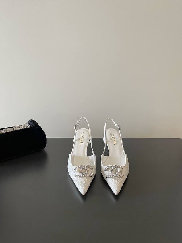 Chanel's latest lace-up, diamond-buckled, pointed-toe, slingback sandals are now