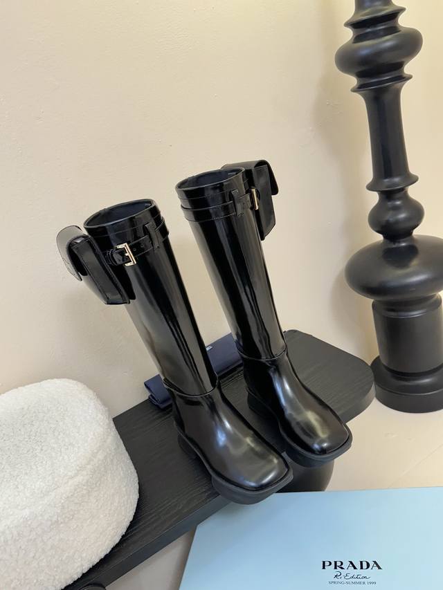 Prad* This classic Prada knight boot looks amazing on your feet and even elongat