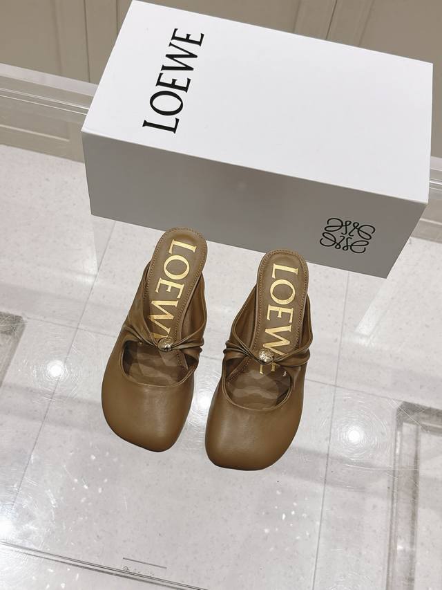 Top-level version of Loewe's popular new kitten-heeled half-slip shoes, matched