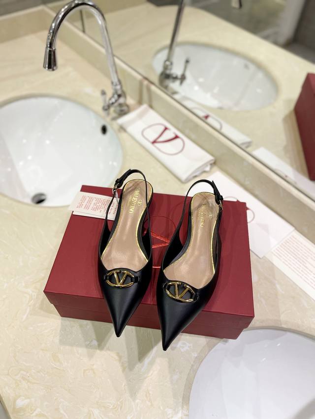 Valentino's newest and latest Logovlogo Signature, featuring pale gold accents a