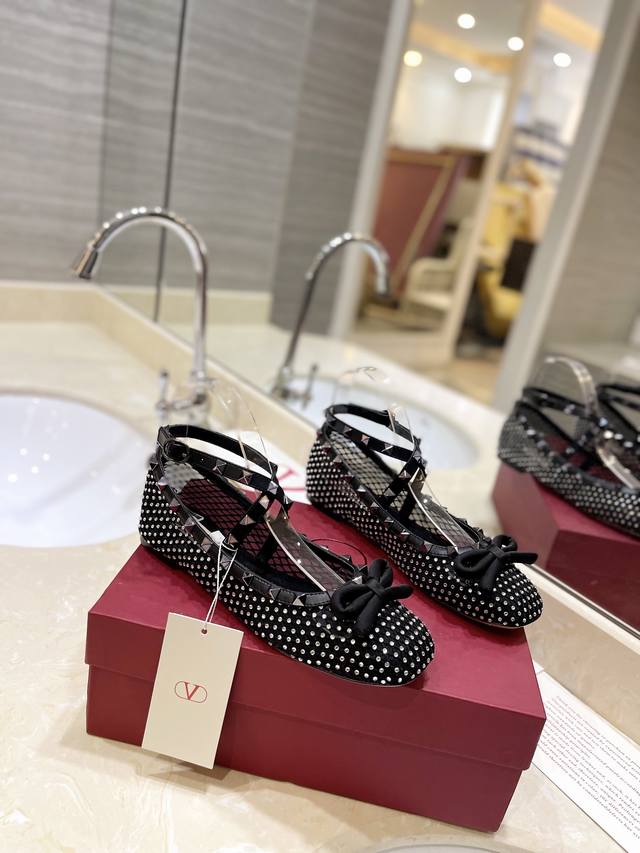 Valentino's new Rockstud imitation crystal decorated mesh ballet flats. The rive