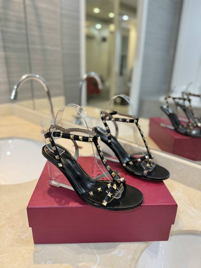 Valentino's newest rivet-themed summer shoe features crystal clear, clean, and f