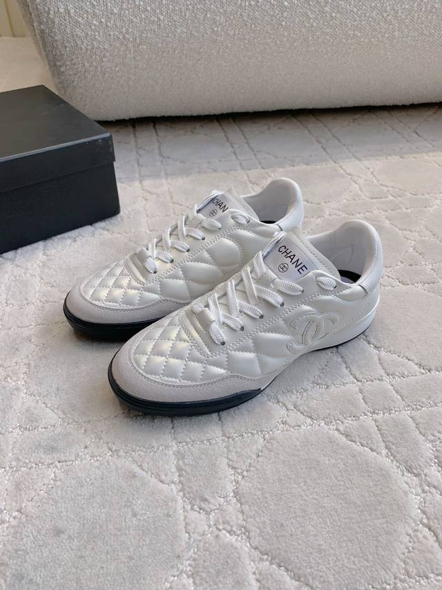 Chane*'s new dopamine colorway, diamond-patterned leather sneakers. The chic, ch