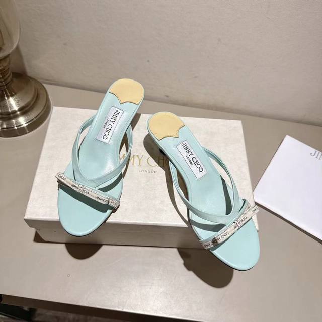 Jimmychoo's 2025 ice cream blue ribbon mules are here, paired with a logo bow, g