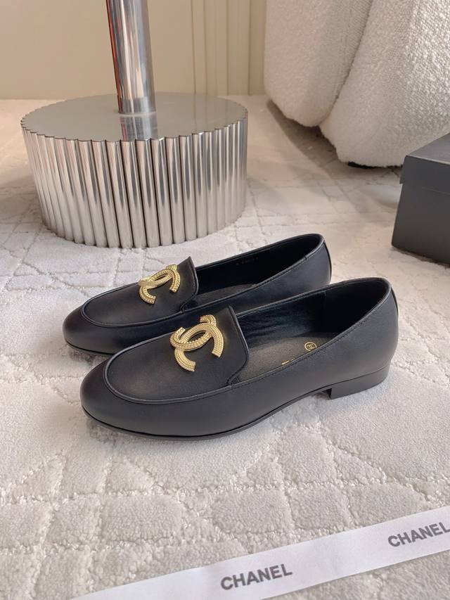 Chane*'s new large logo loafers are a timeless classic silhouette with a double