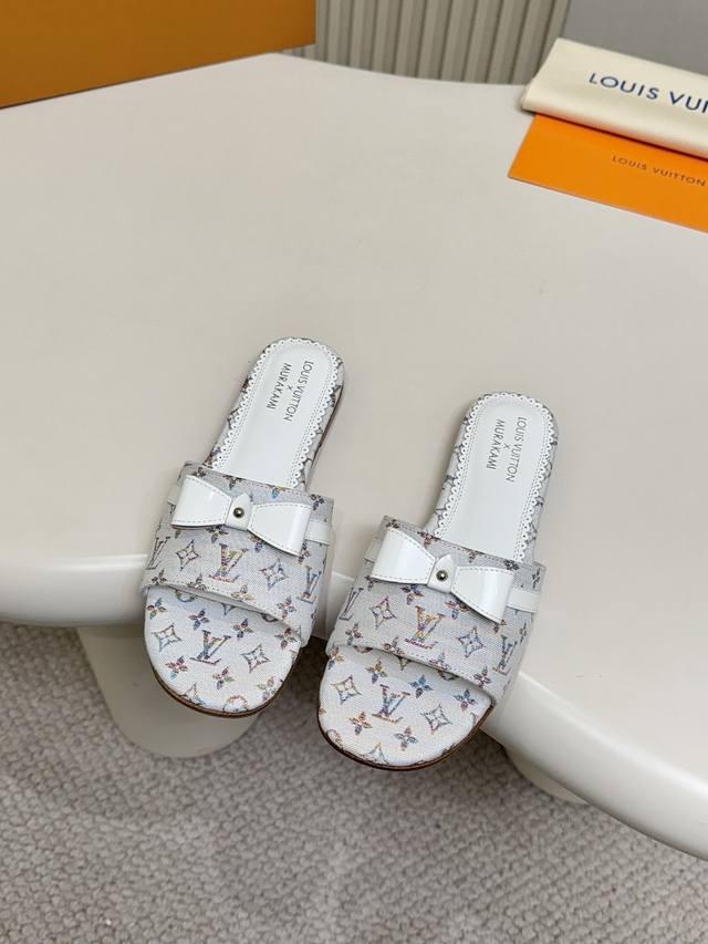 The top-of-the-line Louis Vuitton flat slippers are a fashion must-have. These L
