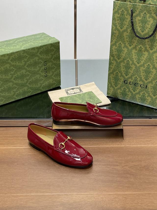Gucci's new early fall collection features the latest patent leather, burgundy,