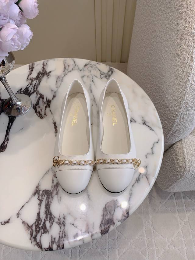 Chane*'s new rhinestone chain flats are a timeless silhouette with a double C lo