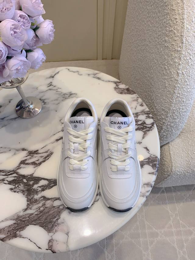 Women's Sizes: DDD. Chane*'s new thick-soled gradient sneakers, the Coco, are a