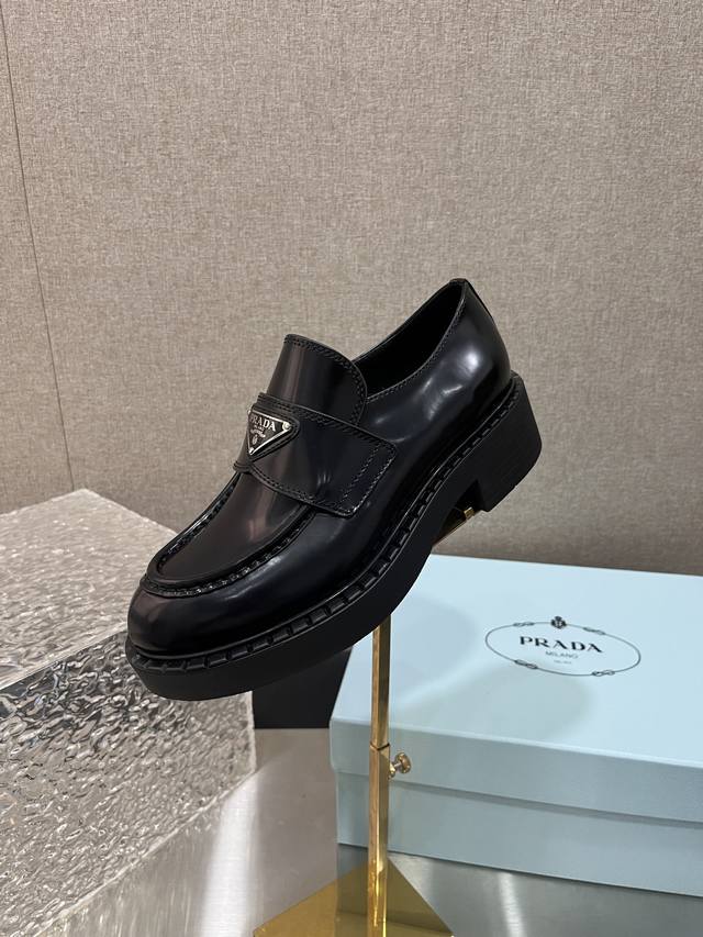 Hey everyone! These classic Prada platform loafers are absolutely stunning! The