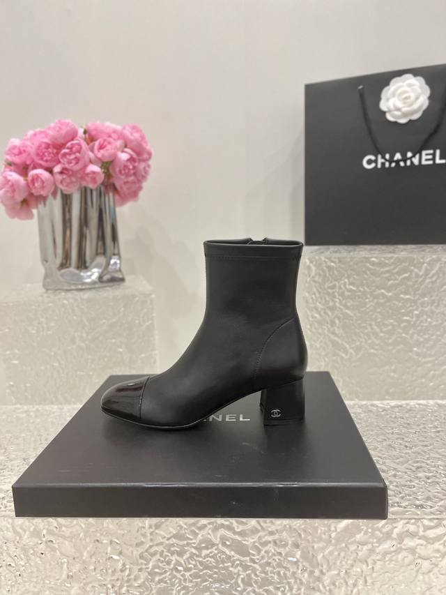 A classic Chanel colorblock stretch ankle boot! The upper is made of Italian im