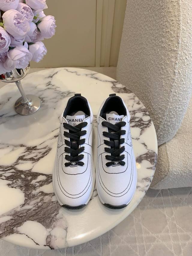 Chane*'s new embroidered Coco sneakers are a must-have for every girl. You can a