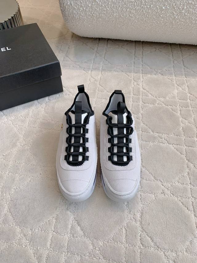 Chane* Classic thick-soled sneakers in the classic black and white panda colorwa