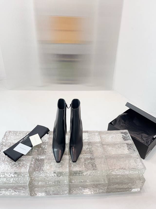 Yves Saint Laurent high-heeled boots. The design highlight of this YSL boot is i
