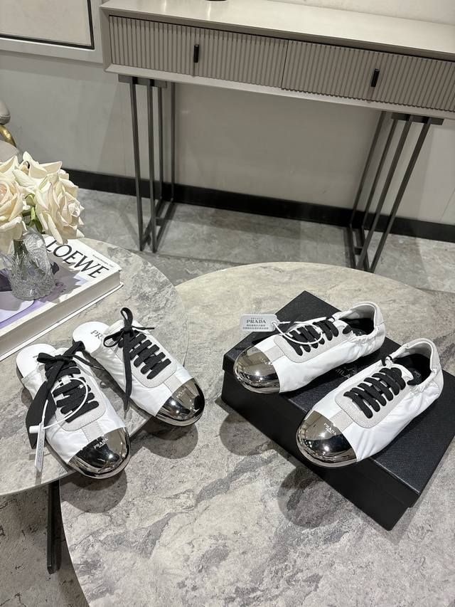 Half-slip on, single shoe; Prada Spring/Summer runway style thin-soled Dexter s