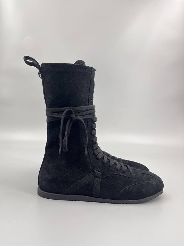 Ann Demeulemeester 25 Autumn/Winter Boots DDD. The design concept is a fusion of