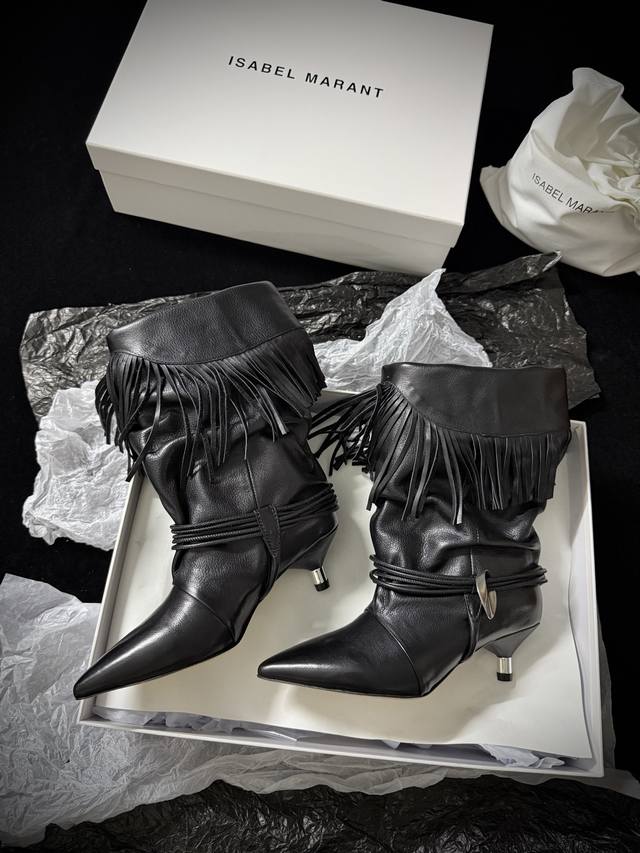 Isabel Maran*' s new fall/winter tassel boots. The suede pleats create a relaxed