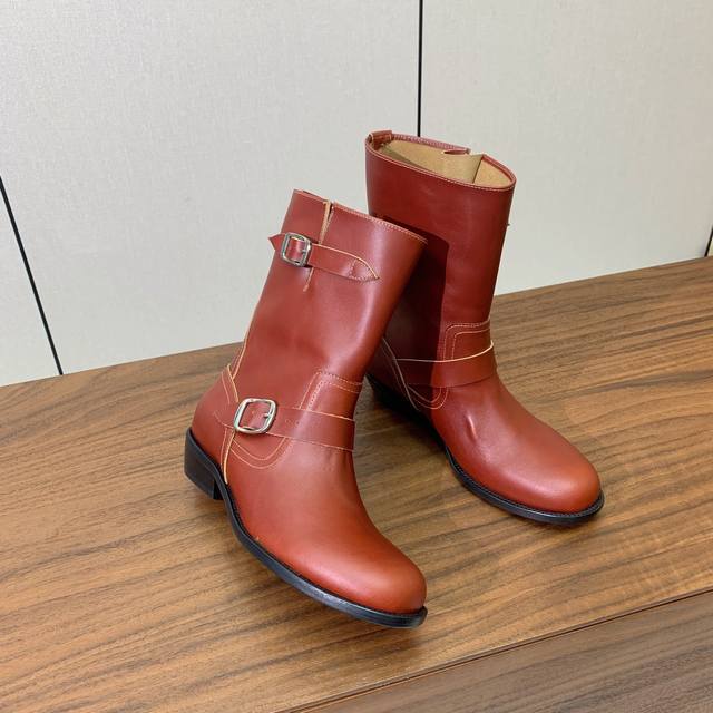 Chl*E flat ankle boots. The overall boot shape is very unique and very slimming.