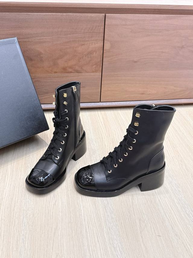 Shopping-level Chanel's new round-toe, thick-soled Martin boots. Super comforta