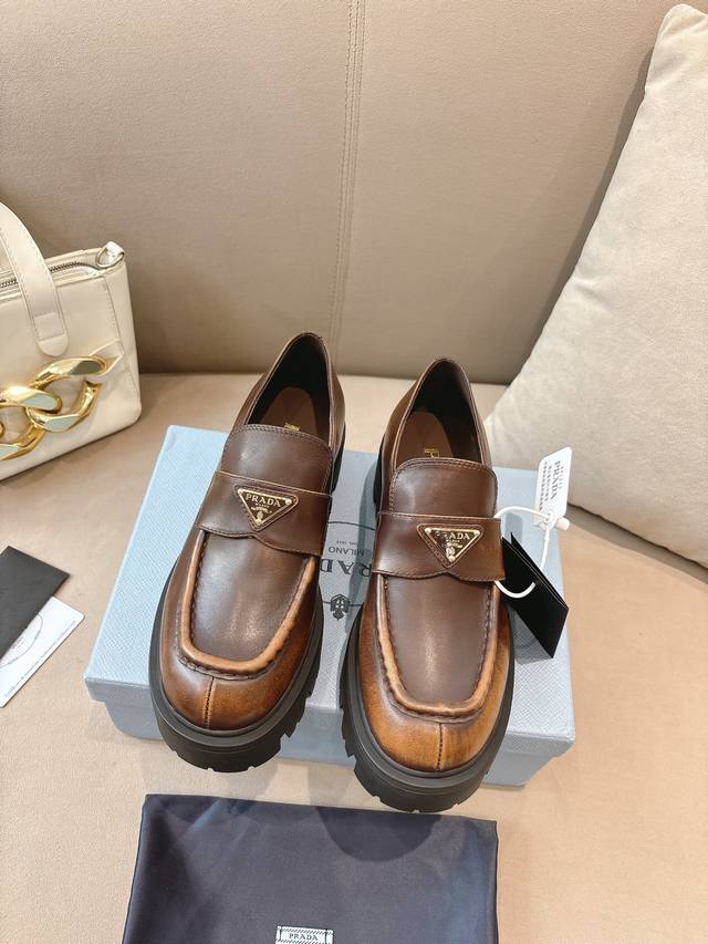 Mary Jane Triangle Buckle Loafers The iconic Monolith shoe's geometric design an