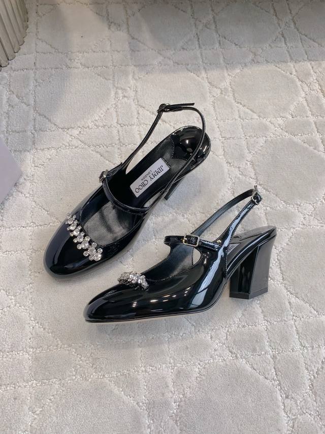 Jimmy Cho*'s new rhinestone patent leather slingback pumps are a classic and ver