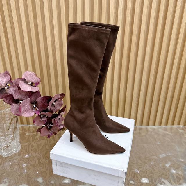 The Row's new fall/winter 25S stretch boots feature retro pointed toe elements.