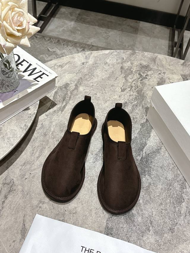 The Row genuine leather minimalist slip-on flat loafers with a slip-on design! T