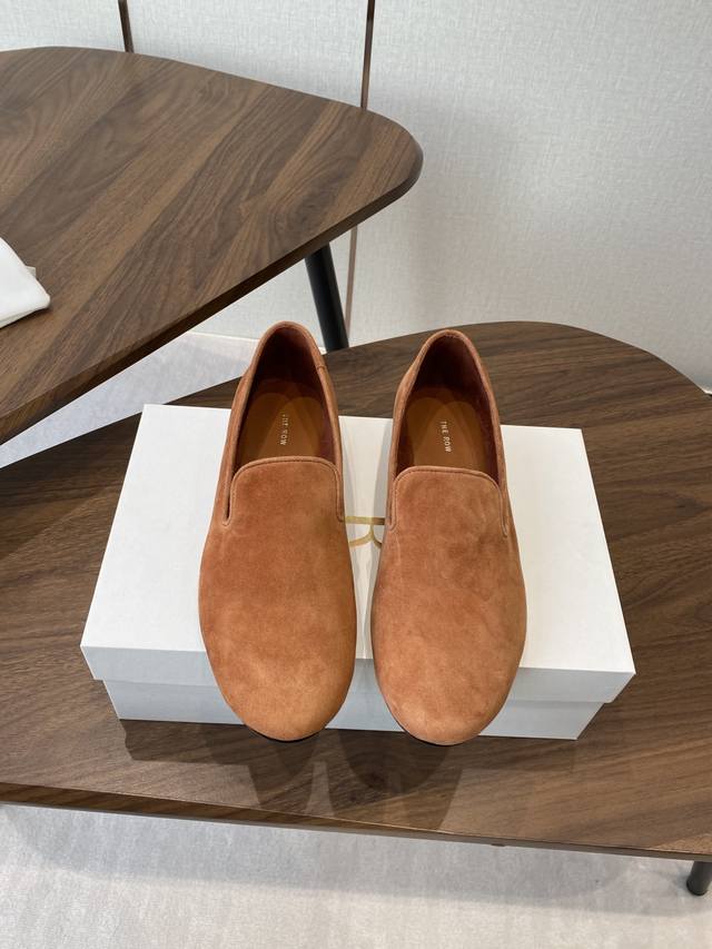 The Row's latest minimalist suede slip-on loafers, made in Dongguan. DDD. This