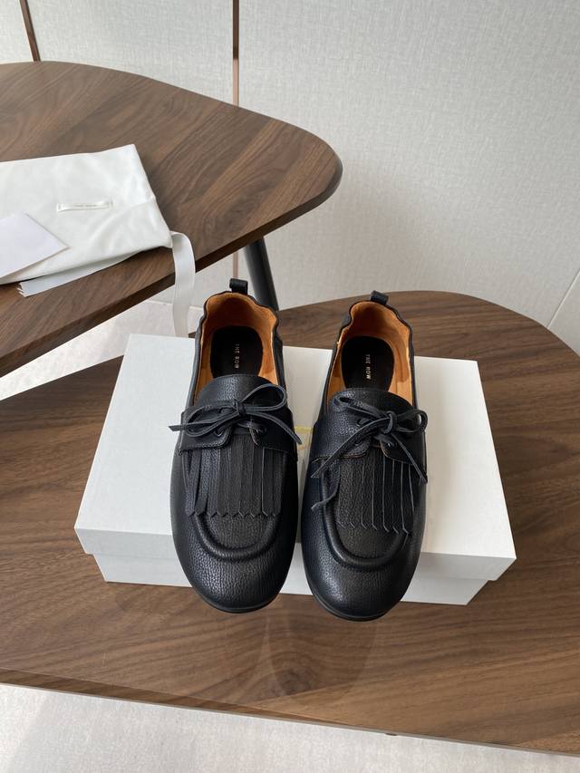 The Row's Autumn/Winter 2025 tasseled elastic loafers, made in Dongguan, are a t