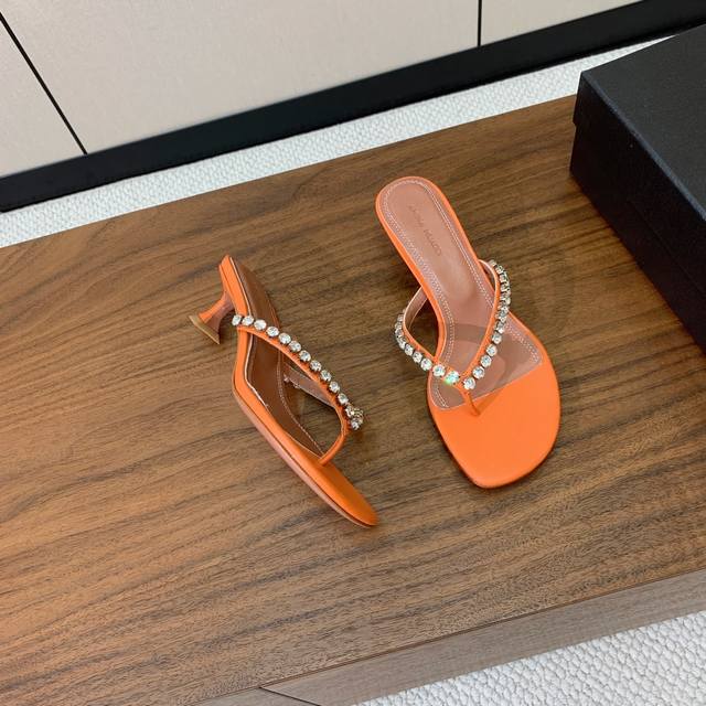 Amina Muaddi diamond chain flip-flops. Elegant style, creating a unique experien