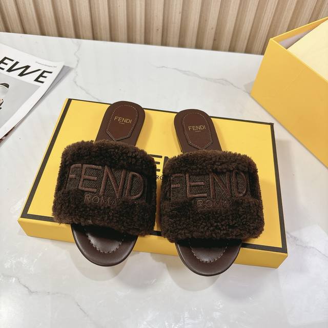 The Fendi show's signature slippers are here! The legs are inspired by the seas
