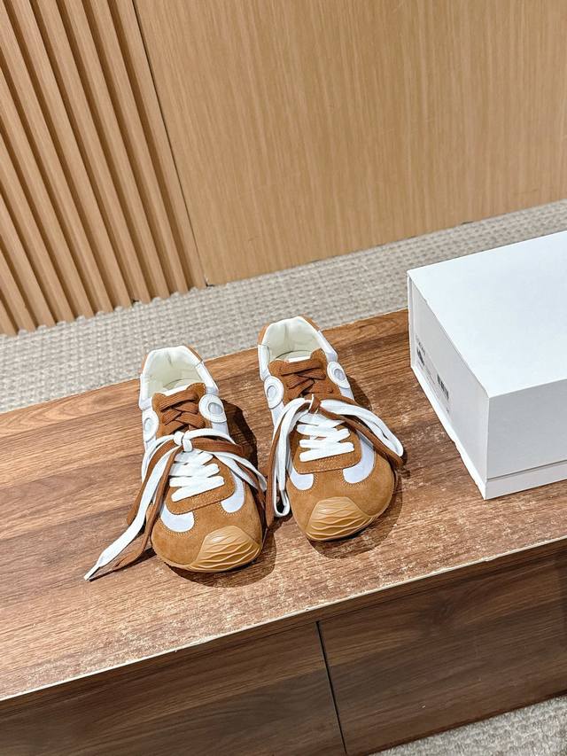 Loewe's new Ballet Runner 2.0 sneakers feature a playful toe design and a novel,