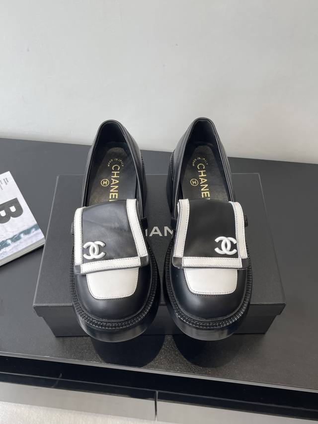 Chanel Panda Colorblock Loafers DDD. Adorable vintage-inspired black and white l