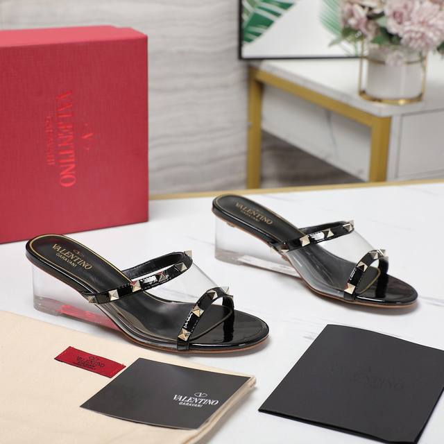 Valentino Valentino These Valentino riveted transparent wedge slippers. Unique a