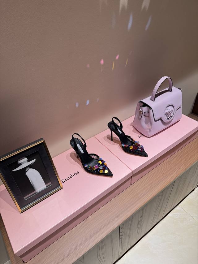 The highest-quality factory-issued Aquazzura high heels with sequined pineapples