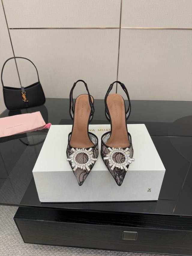 Top-of-the-line diamond buckle Amina Muaddi's stunning high-heeled sandals. Aut