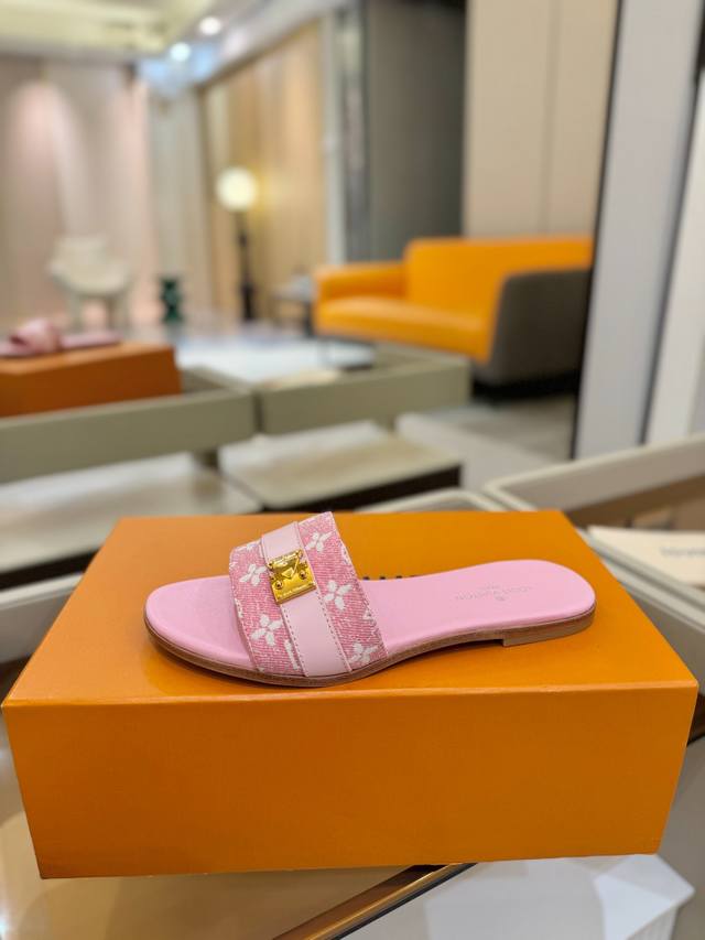 Price: Louis Vuitton Louis Vuitton These LV Isola flat sandals are crafted from