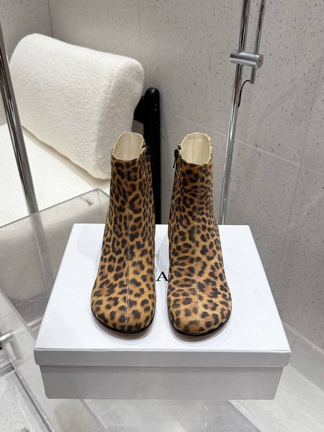 Factory Loewe's new autumn/winter block-heeled, round-toed, nude boots with sid