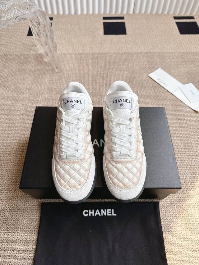 Chanel's popular Dexter sneakers (DDD) combine classic quilted sheepskin with a
