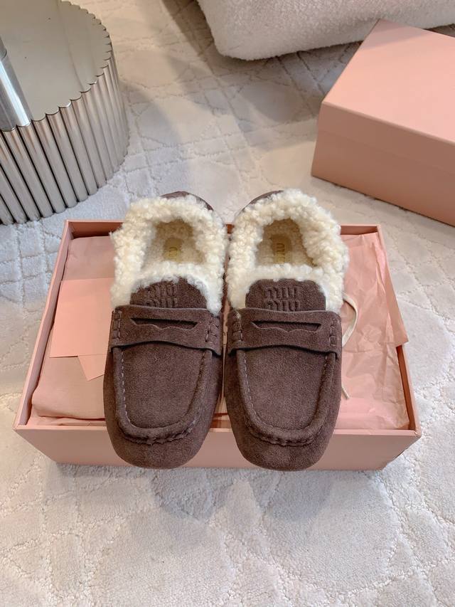 Miu wool-lined flat loafers are retro and stylish, with classic logo accents. T
