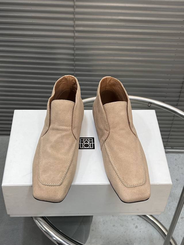 Factory Toteme square-toe high-top flats. Purchase the original and release the