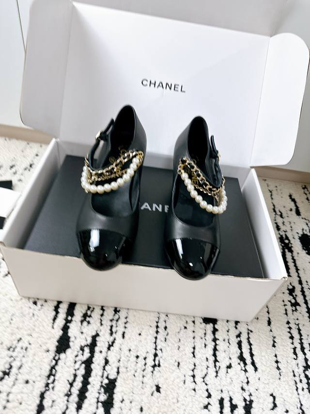 Top-of-the-line pearl-heeled Mary Jane shoes (DDD). This runway model is absolut