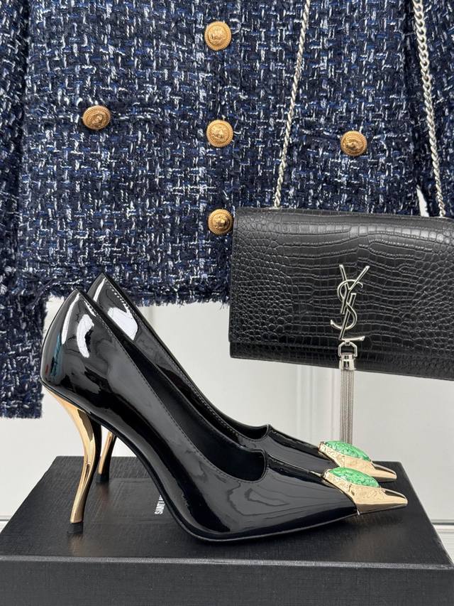 Yves Saint Laurent's classic catwalk jeweled pumps are adorned with jewels and l