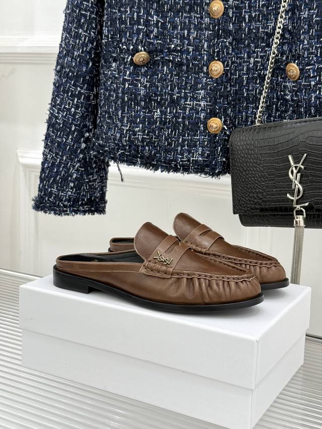 Yves Saint Laurent's new loafer and slip-on shoe. The iconic small logo is the h