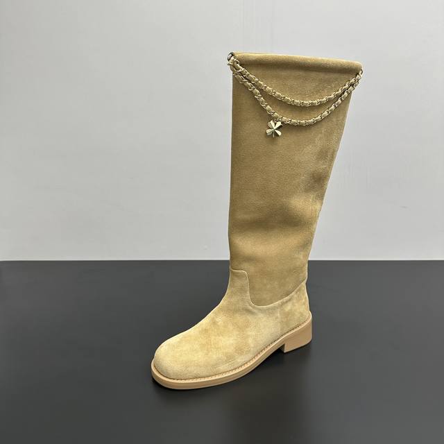 Chanel's new autumn/winter 25B Four-Leaf Clover Double C chain boots, tall boots
