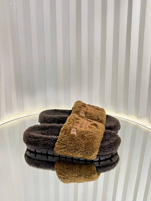 Prada's autumn/winter furry slippers collection boasts original craftsmanship i