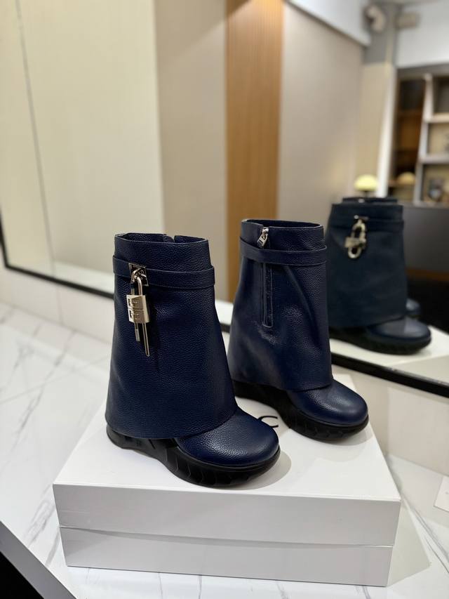 Givenchy's new wedge-heeled shark boots that increase height and make you look s