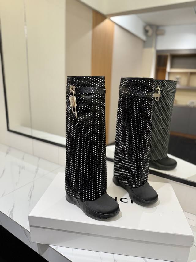 Givenchy's new wedge-heeled shark boots that increase height and make you look s